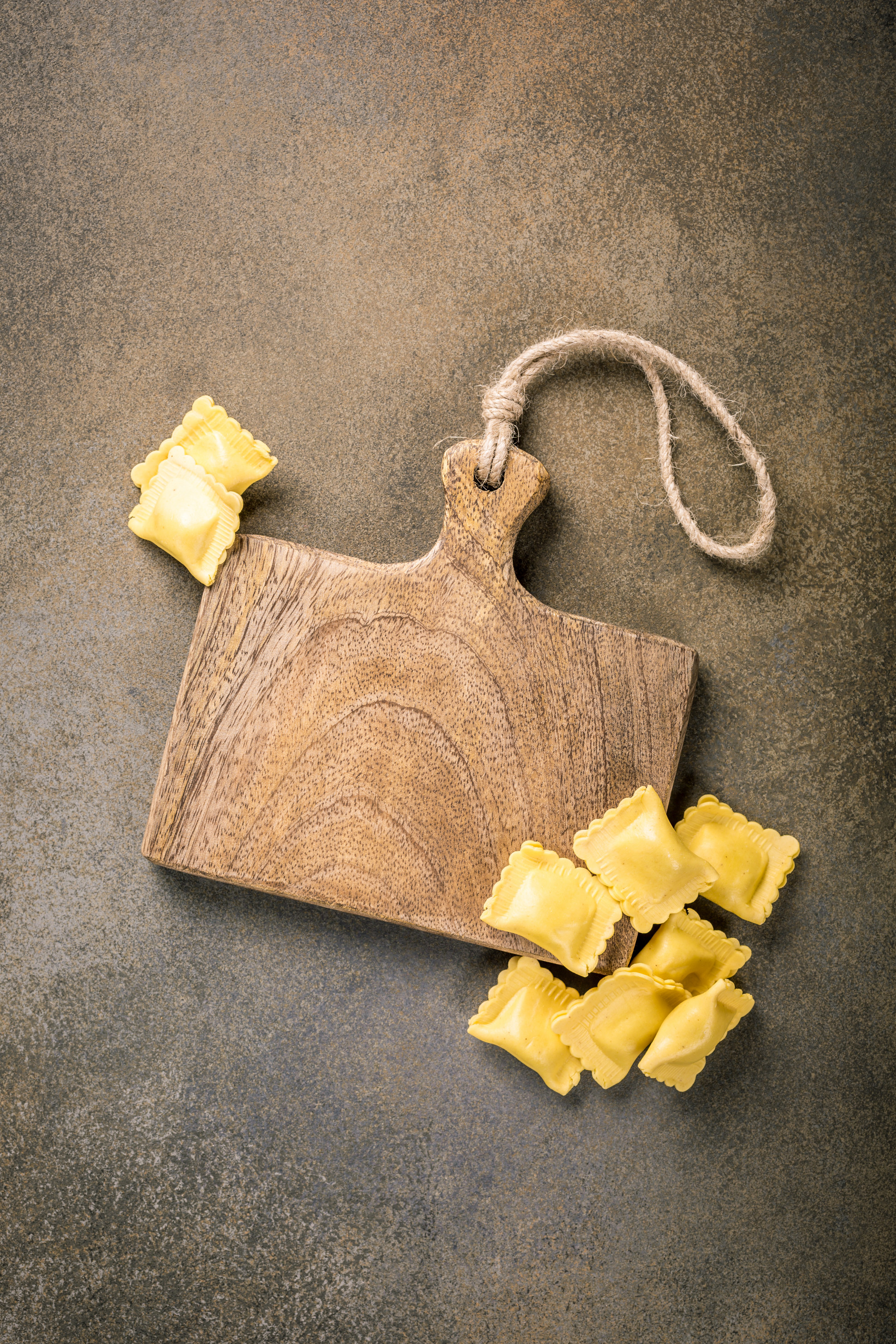 Close-up of handmade ravioli on board